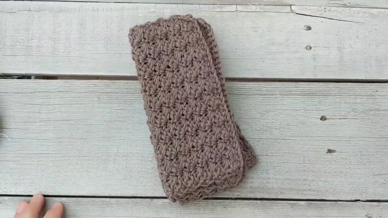 Quote from creator's blog post: A pretty braided cable dishcloth