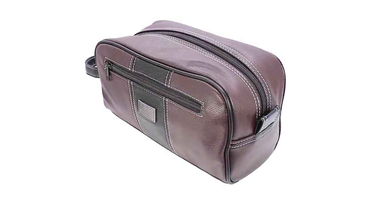 Neceser de los Florida Gators para hombre. Acabado en PU marrón granulado. Logotipo plateado de UF. Resistente al agua. Diseño compacto y espacioso. video poster