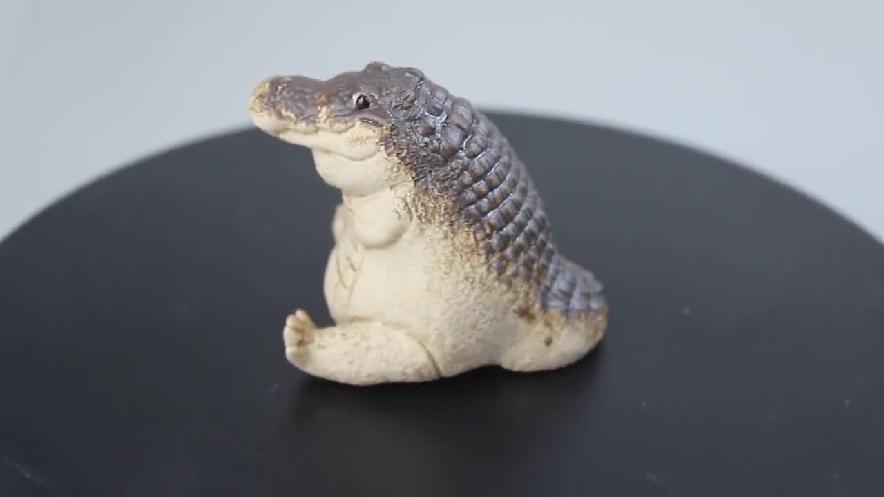 Cute clay Alligator Sculpture: Adorable Crocodile Figurine for Tea Lovers video poster