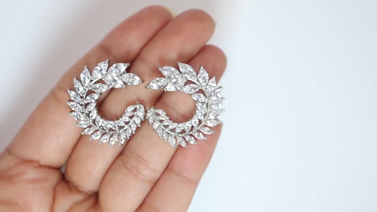 White Gold And Diamond Wreath Earclips Available For Immediate Sale At  Sotheby's