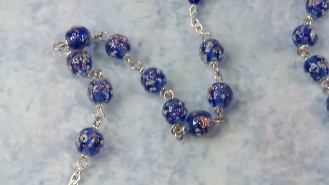 Handmade Catholic Clear with Blue Glow in the store Dark Glass Bead Rosary with Queen of Angels Center Medal