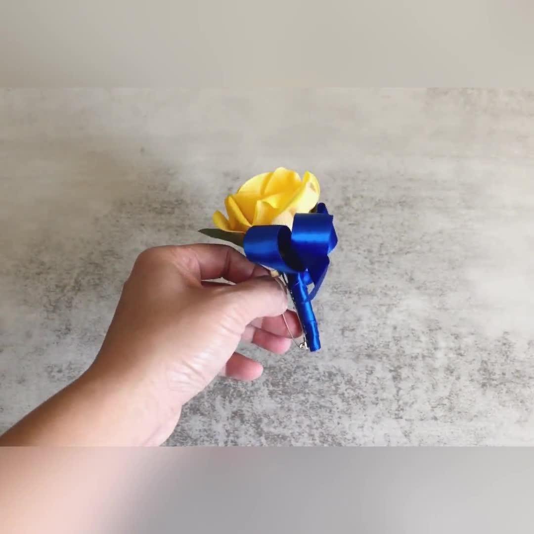 Yellow Rose Boutonniere With Blue Ribbon