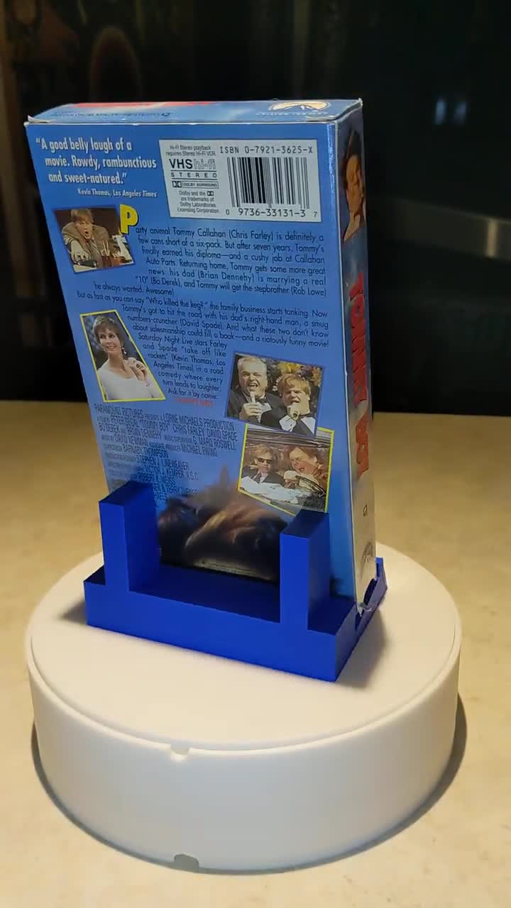 VHS Tape Display Stand: Compact Design for Standard & Clamshell