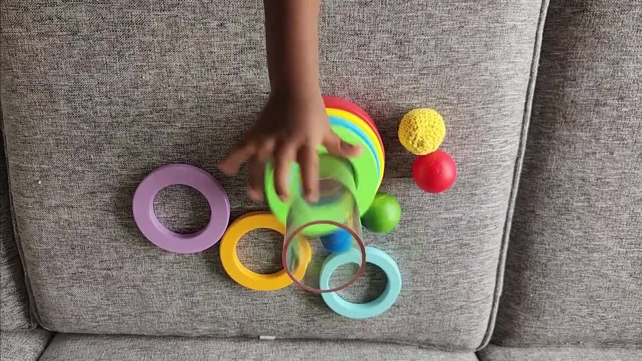 Clear tube with stacking 2024 rings and baby ball