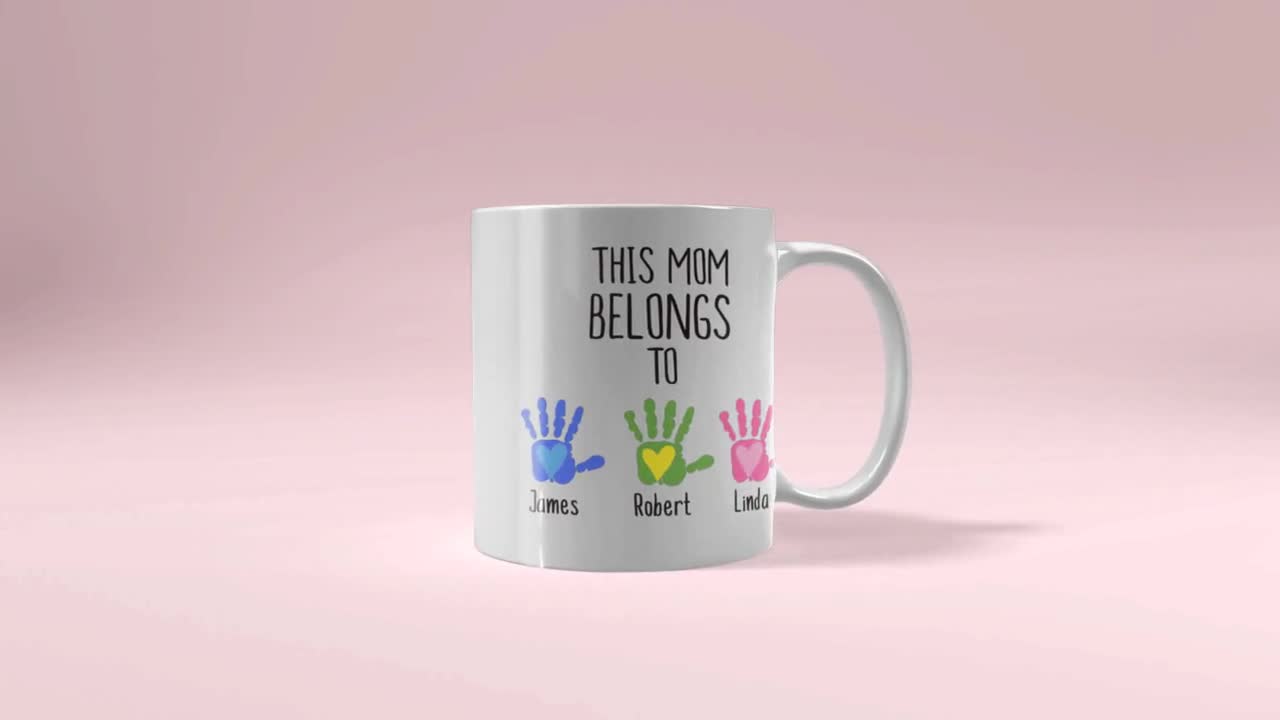 https://v.etsystatic.com/video/upload/q_auto/This_mom_belongs_to_handprint_coffee_mug_Kids_name_mom_mug_handmade_Hands_down_mommy_ceramic_mug_xnnja8.jpg