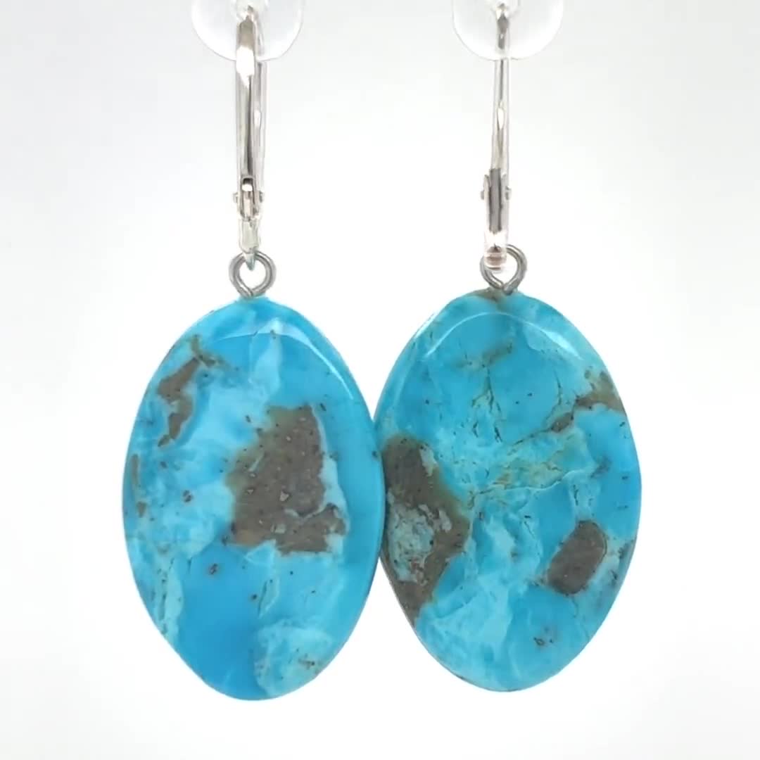 Orecchini a cerchio, in argento, con chiusura a scatto Orecchini a cerchio, in argento, con chiusura a scatto