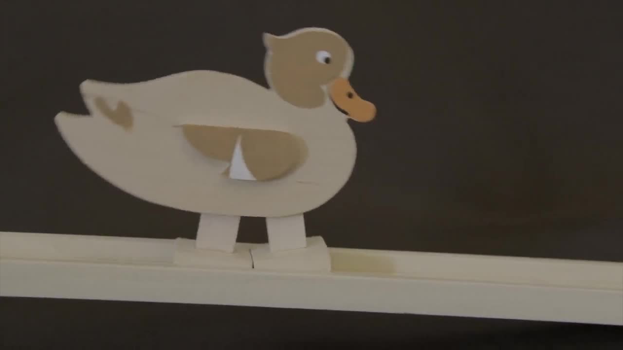 Wooden Motion Toys Duck Brown 