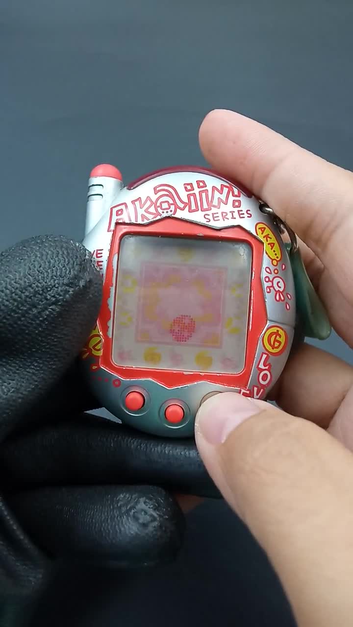 SKU B833P9958 | Bandai Japanese Tamagotchi Connection V3 Akaiin