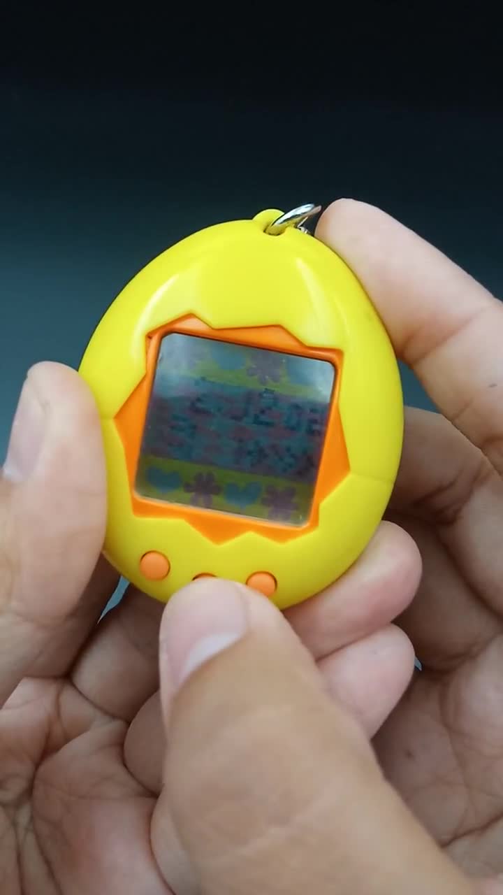 SKU B697P7259 | Tamagotchi P1/P2 Yellow Orange Bandai Japan - Etsy UK