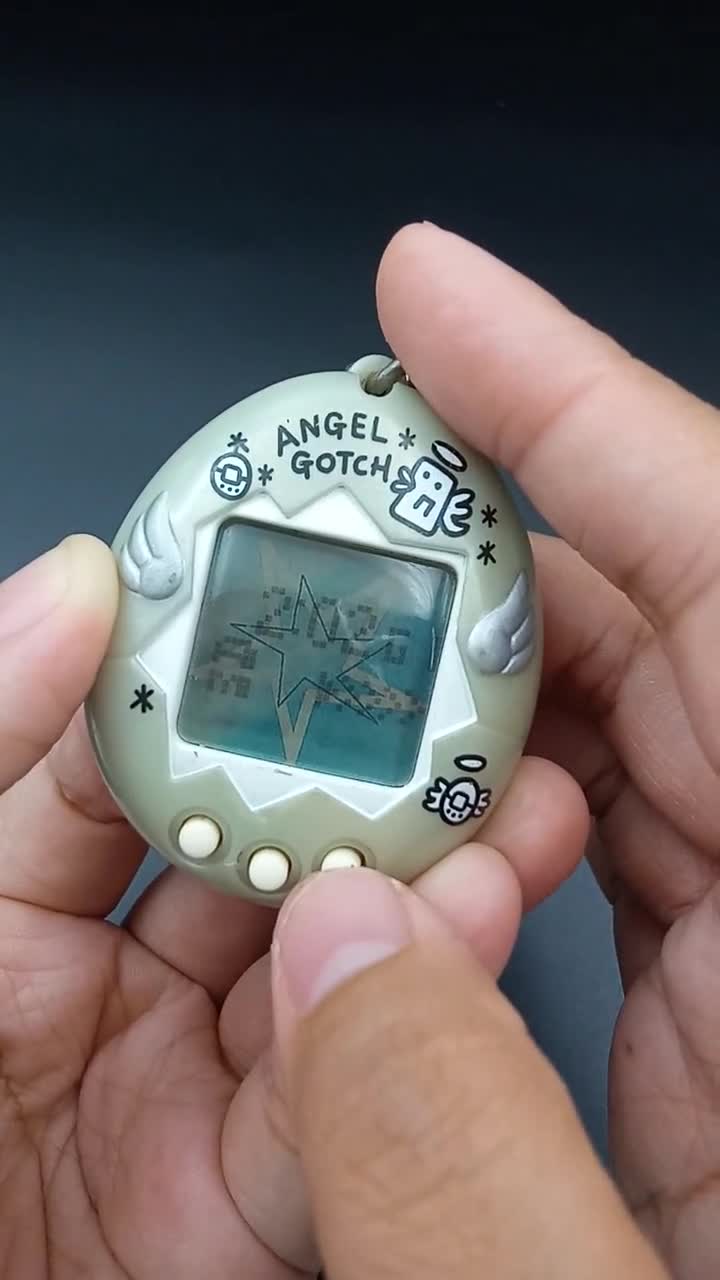 SKU YU147 | Bandai Japanese Tamagotchi Angel Gotch Silver Toy - Etsy