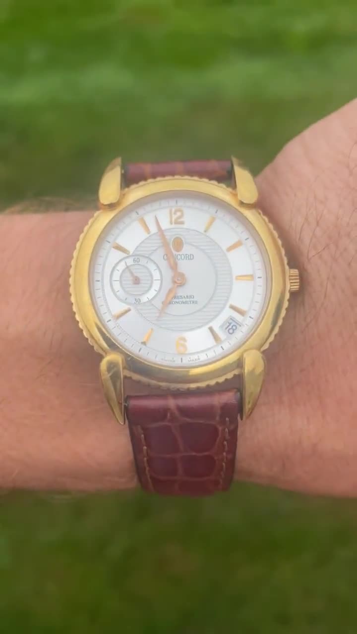 Concord impresario 18k online gold watch