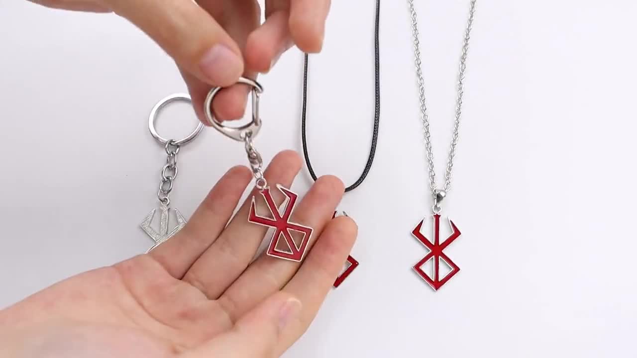 Collar Símbolo De Berserk El Guerrero Loco Huevo Del Rey Behelit Collar Símbolo De Berserk El Guerrero Loco Huevo Del Rey Behelit