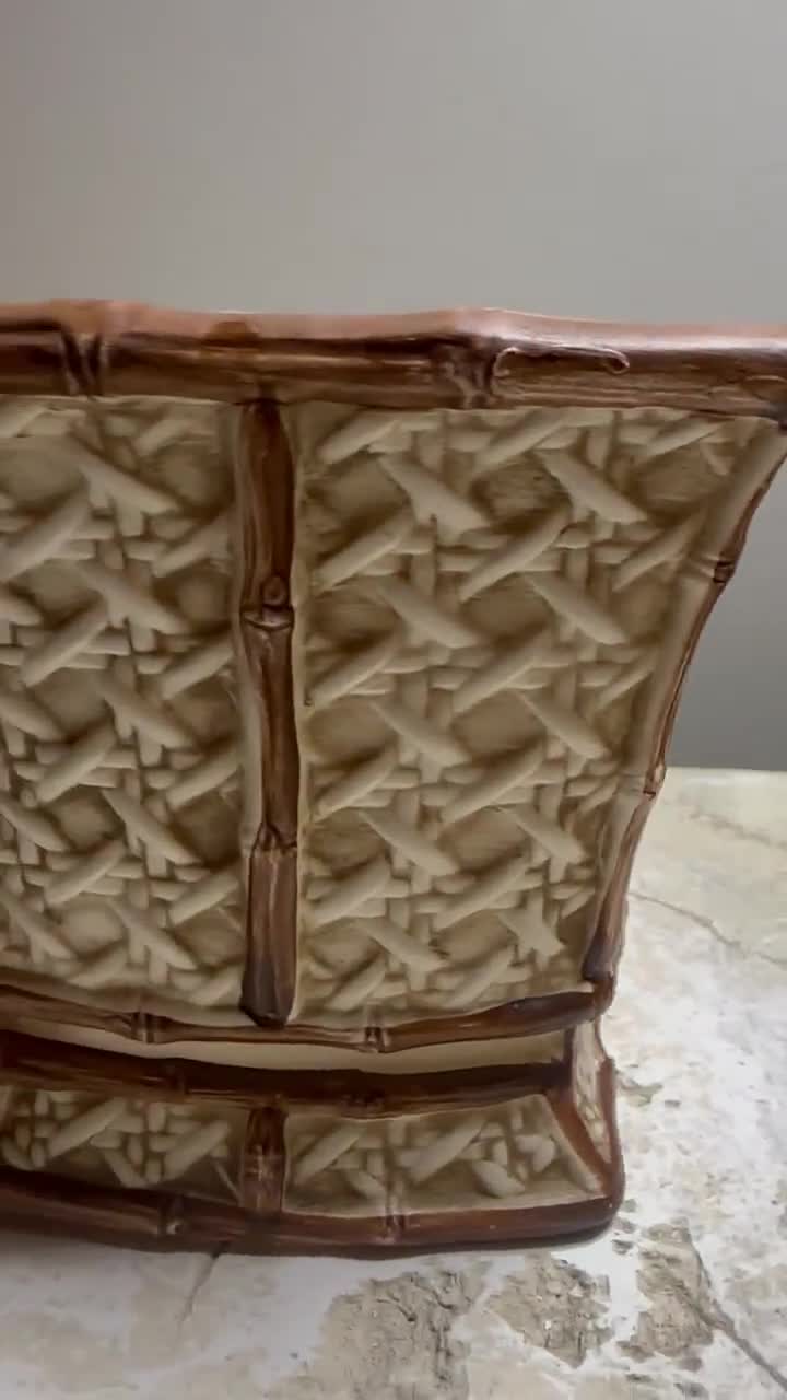 This is a Vintage Inarco Ceramic Planter With a Faux Bamboo and