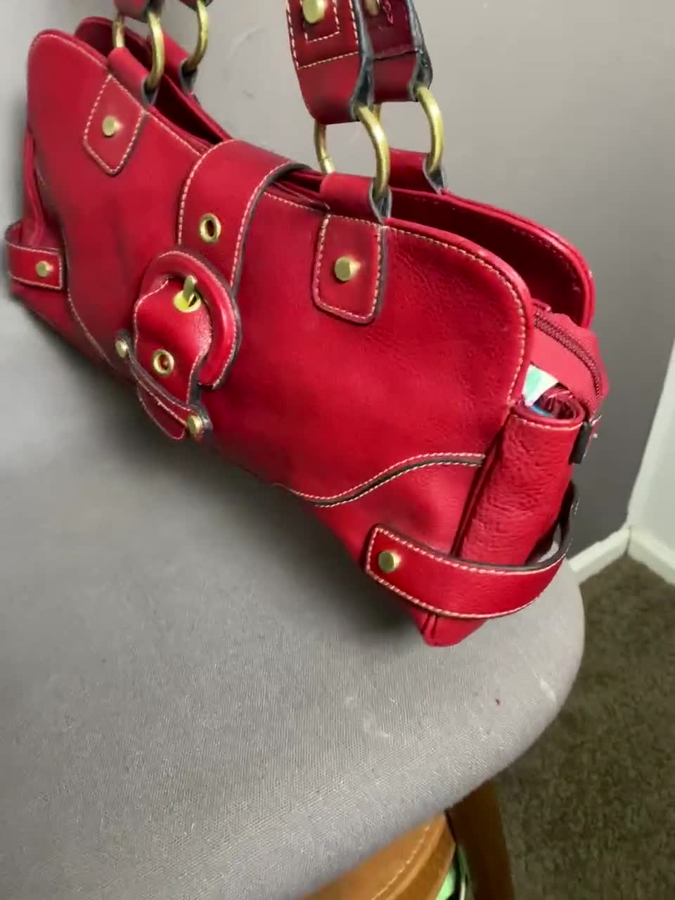 バッグ vintage leather red stitch shoulder bag il_fullxfull.1835634528_rkjm.jpg