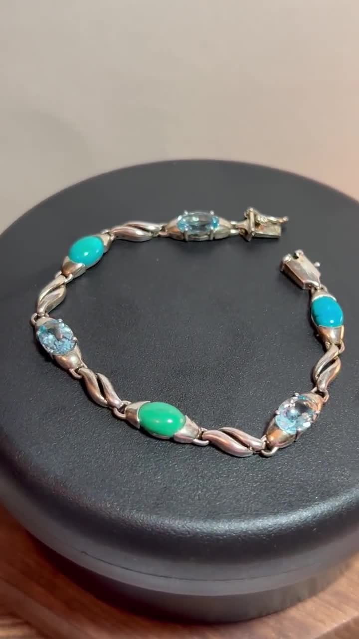 スリーピングビューティー ターコイズ スイスブルートパーズ