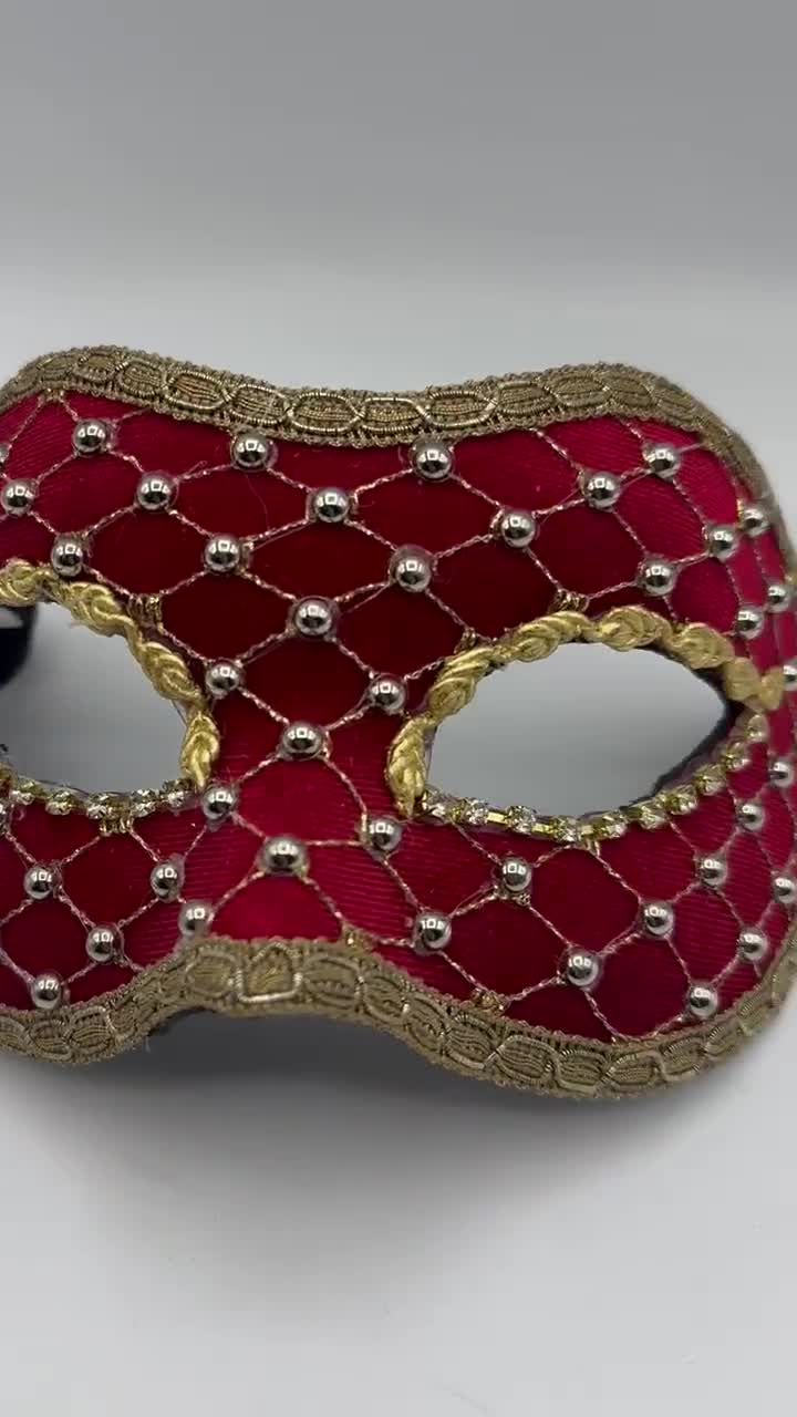 Masquerade ball mask in red velvet with gold grid and golden stones.  Handmade Venetian mask.