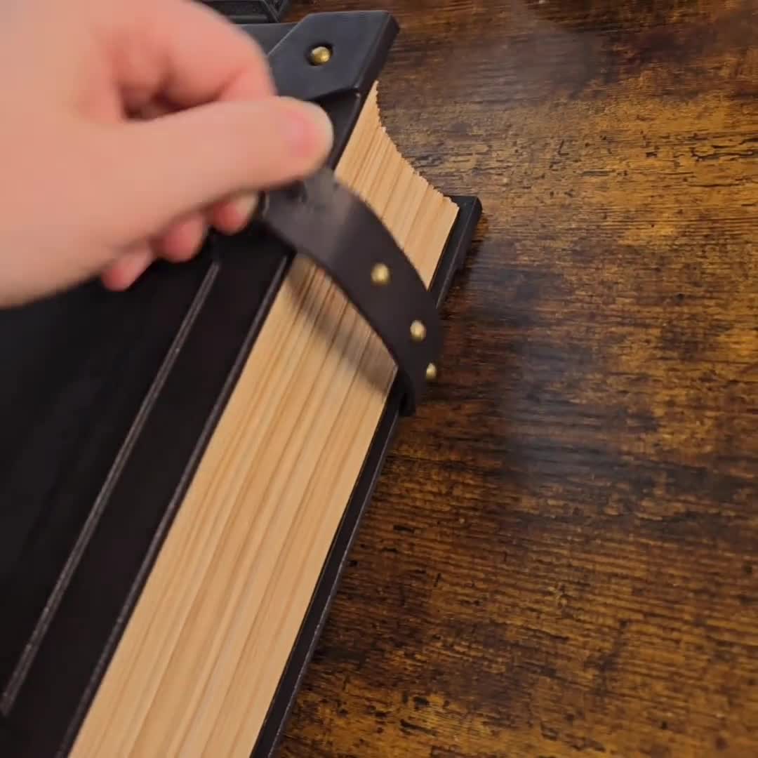 Black leather journal, Medieval style. Blank book video poster