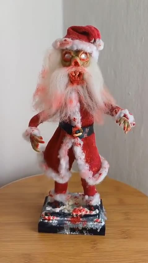 Creepy scary doll selling with Santa head