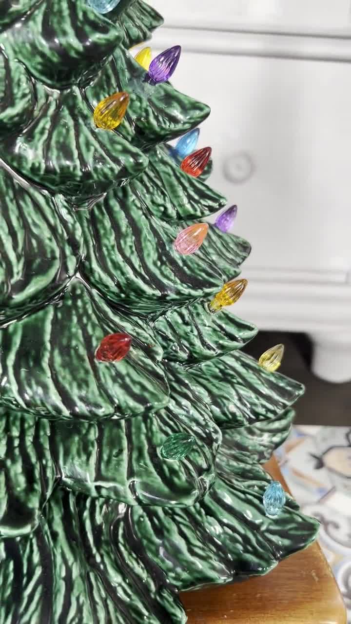 Snow-dusted Christmas Tree With Multicolor Bulbs & Plastic Star