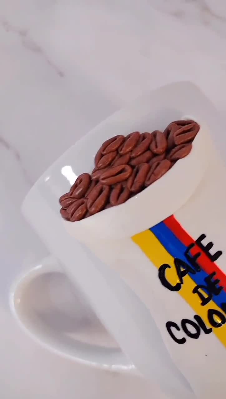 Tazza da caffè della Colombia: souvenir da viaggio con bandiera e monumenti - Italia