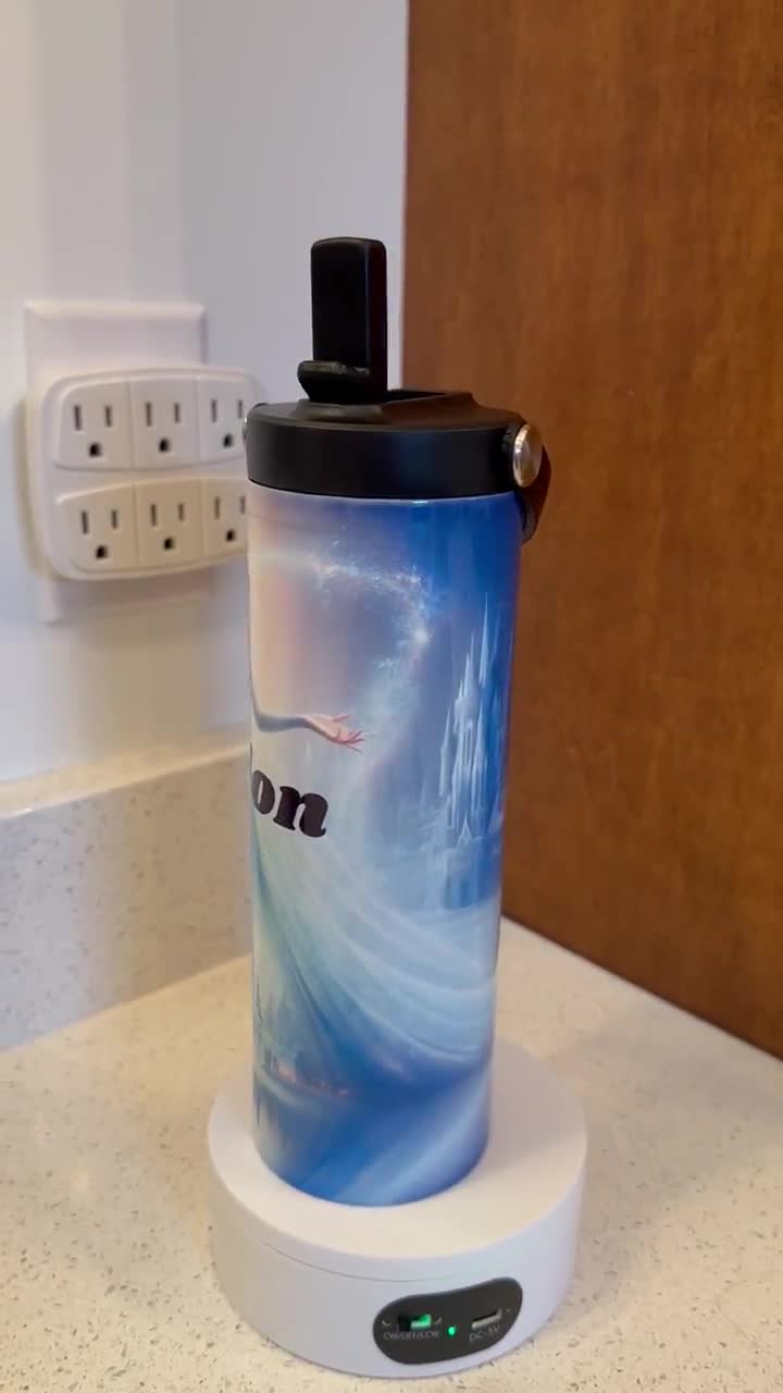 New 22oz tumbler, with flip straw. “Elsa” holds ice 24 hours "Frozen" video poster