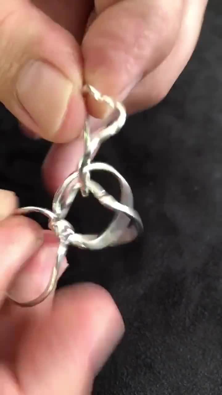 Anillo rompecabezas pesado de 4 piezas en plata de ley video poster