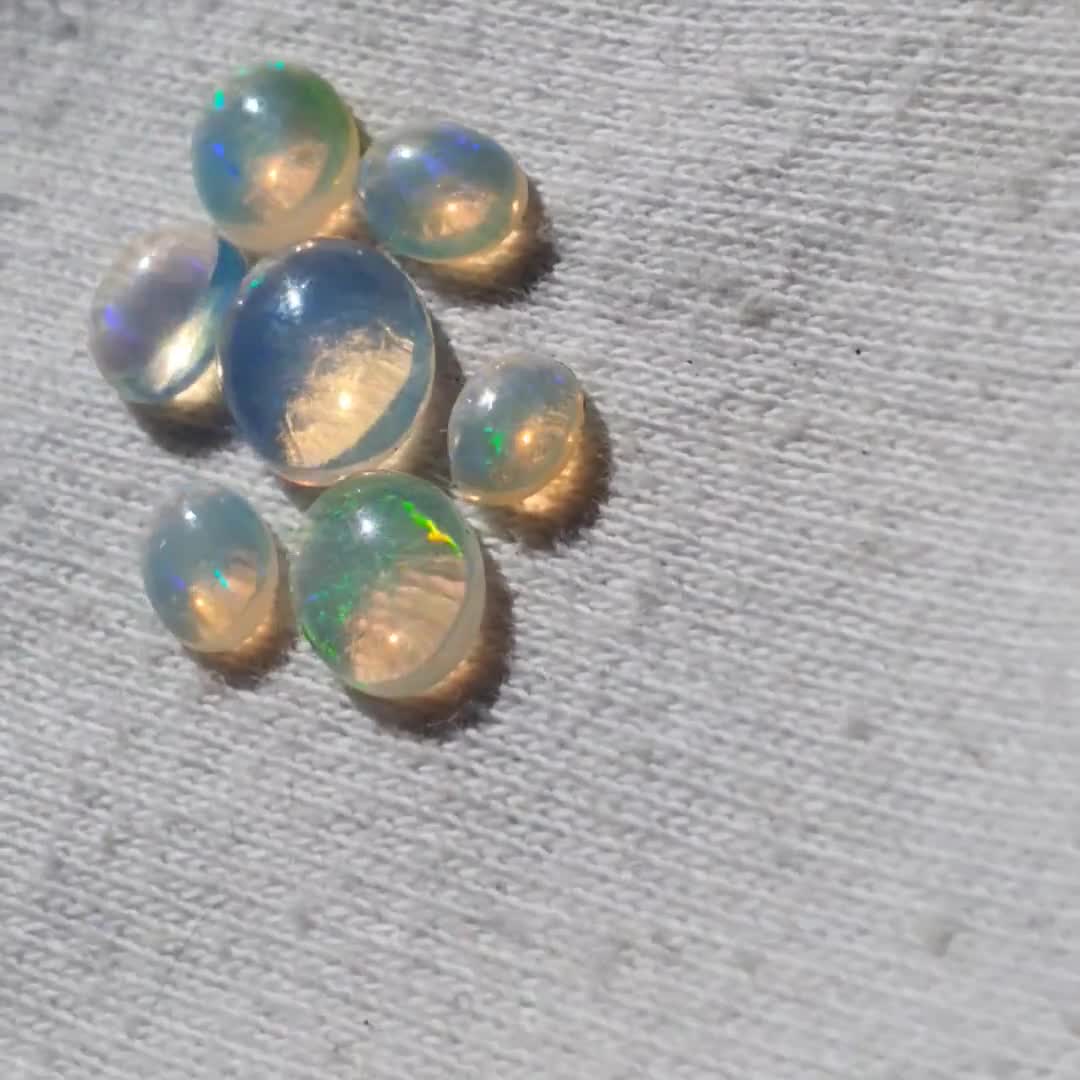 Crystal Clear Opal//7 piece set//Southern Ethiopian, hydrated hydrophane  opal cabochons//stabilized by natural river caves