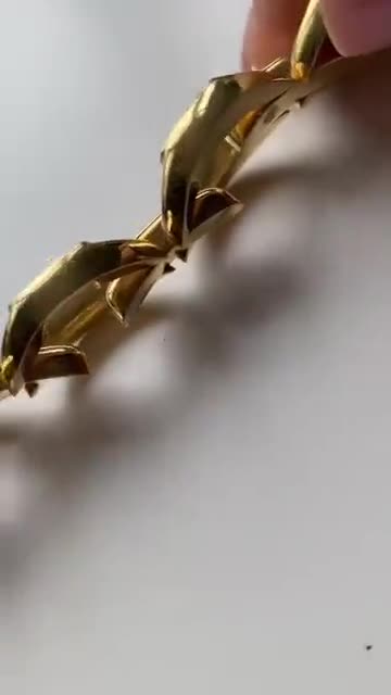 Vintage 18kyg italienisches achteckiges Gliederarmband video poster