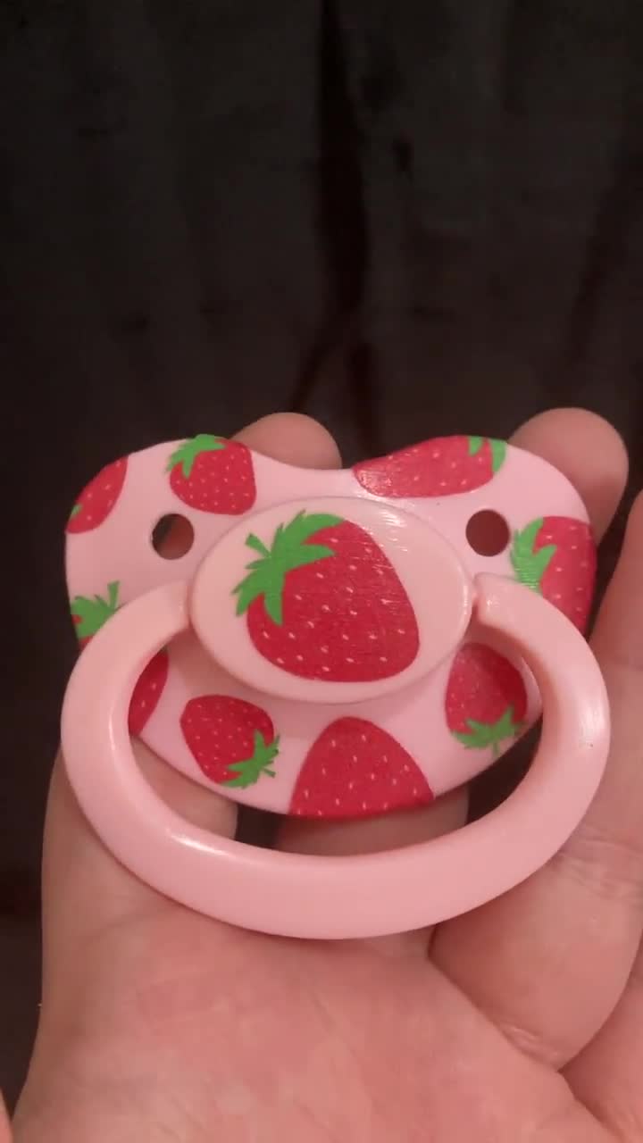 Strawberry pacifier store