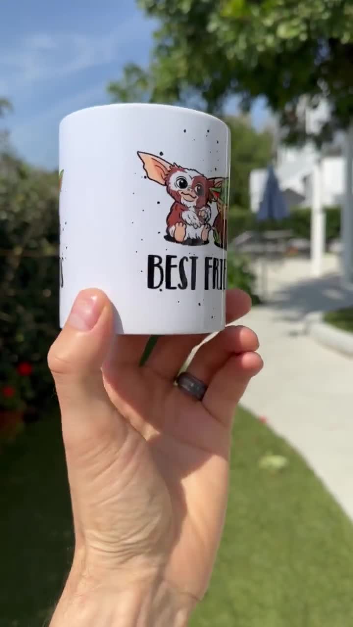 Best Friends Mug – Baby Yoda and Gizmo, Gremlins Coffee Cup, Sci-Fi 80s Nostalgia Gift, Friendship Mug - Funny Gift for Coworker- Ceramic video poster