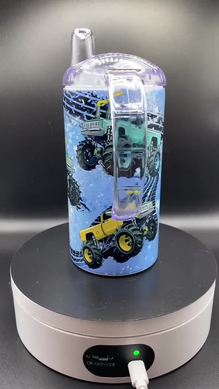 Taza para sorber Monster Truck con tapa adicional video poster