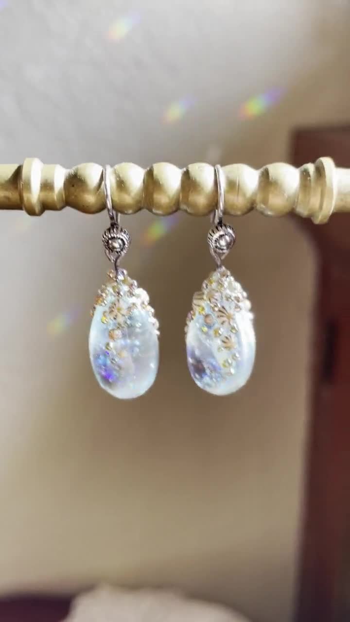 Sparkly barnacle capped flameworked pale Aqua drop earrings