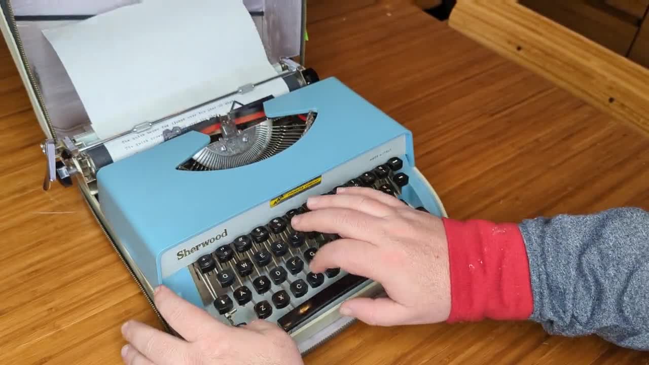 1960's Light Blue IMC Sherwood Portable Manual Typewriter