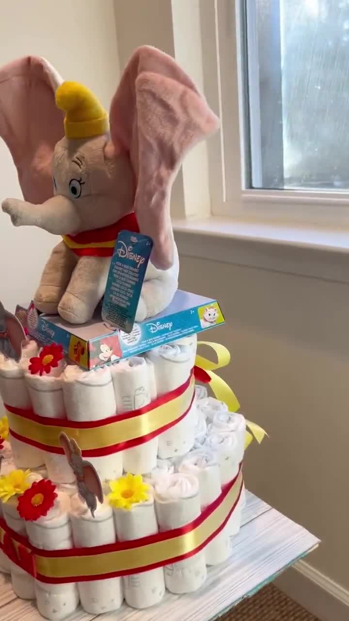 3 tier Jordan diaper cake. 30 diapers, 2 shoe socks and 2 baby bibs factory