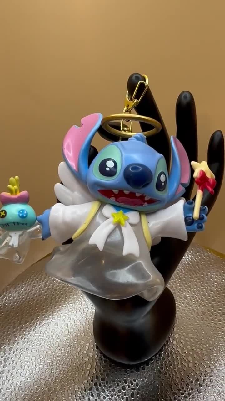 Stitch como ángel con dije para bolso de varita video poster