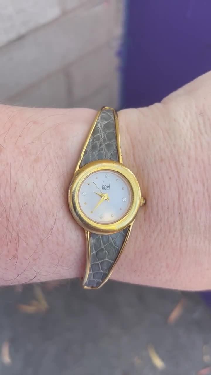 Vintage HEEL Gold Tone Cuff Quartz Watch From Japan With