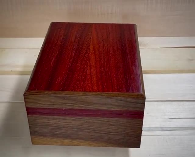 Walnut jewelry box with padauk arms, solid copper trim pieces and