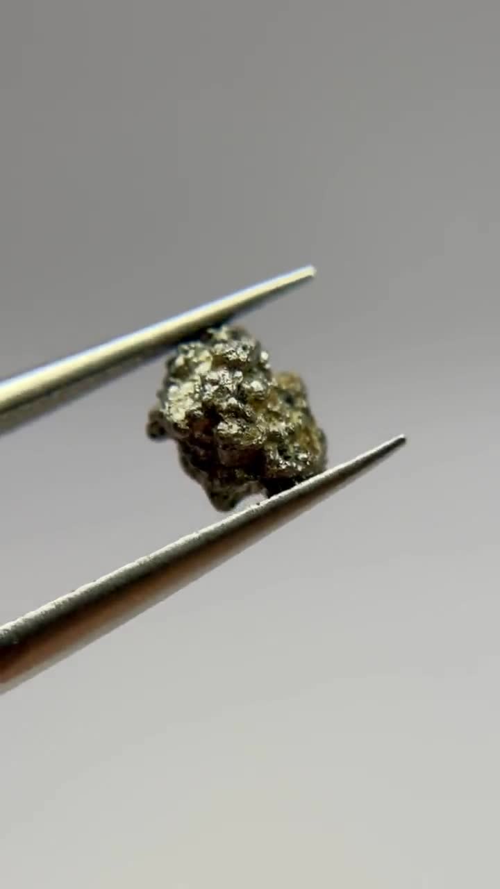 Native Platinum crystal (nugget) from Konder, Aldan shield, Khabarovskiy kray, Far East Siberia. video poster