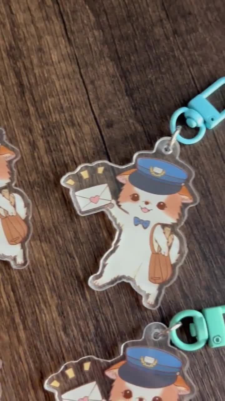 Mochi Mailman Acrylic Keychain | Vintage Mailman Charm | Kawaii Dog Mail Carrier Bag video poster