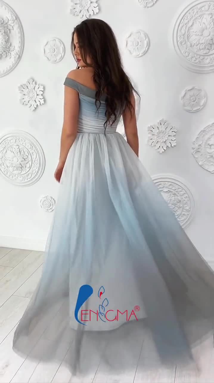 Off-shoulder ombre tulle bridesmaid maxi dress with draped bodice.