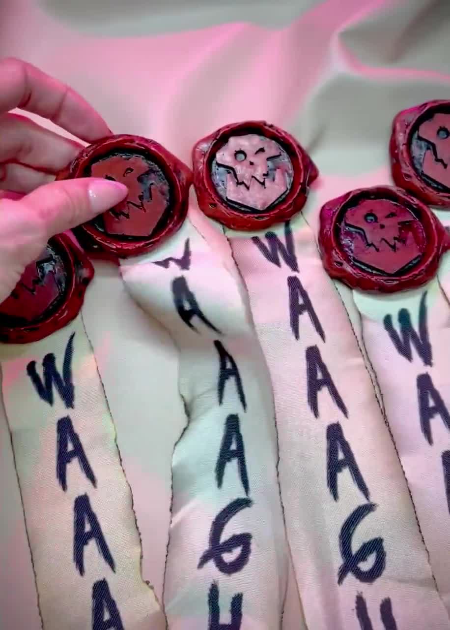 Purity Seal; ork wagh seal pin brooch red reflective mirror sign video poster