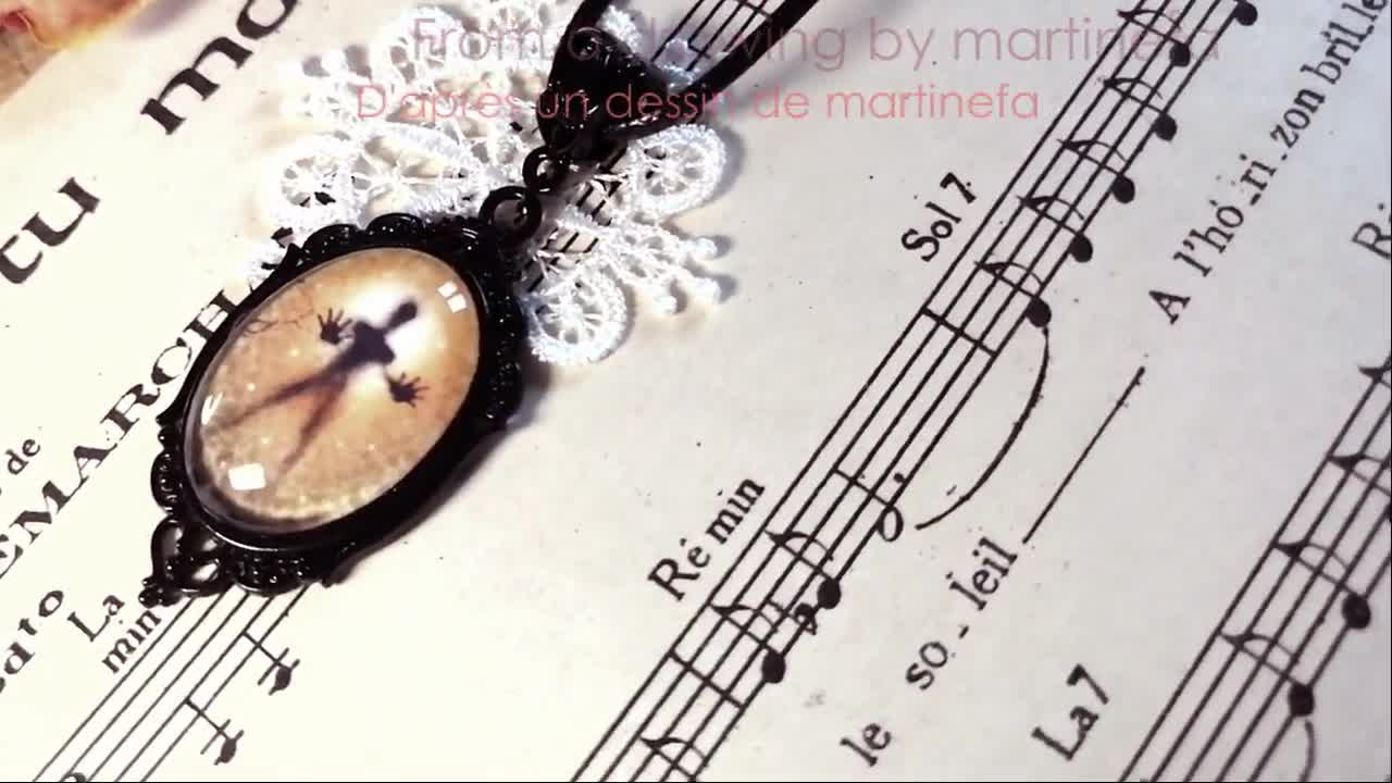 Dibujo de martinefa "PLANTE CARNIVORE" (Planta carnívora) montado en colgante video poster