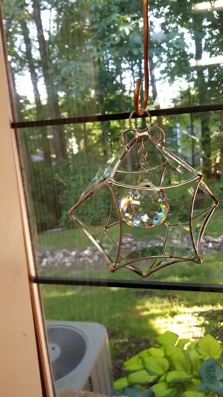 Products :: 3D stained glass spinner. Twirling rainbow colors with bevels.  Hanging beveled prism sun catcher for inside outside. Expertly handcrafted  home decor