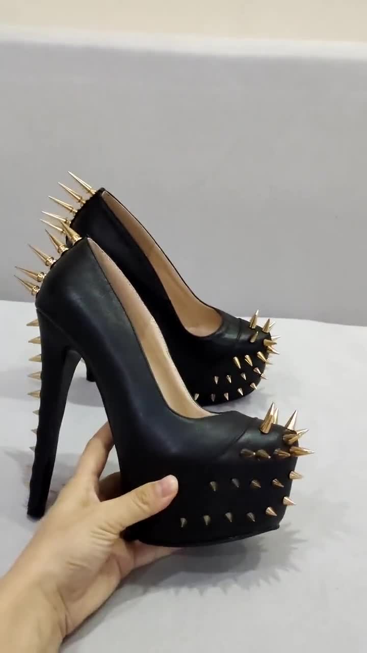 High heels with orders spikes on them