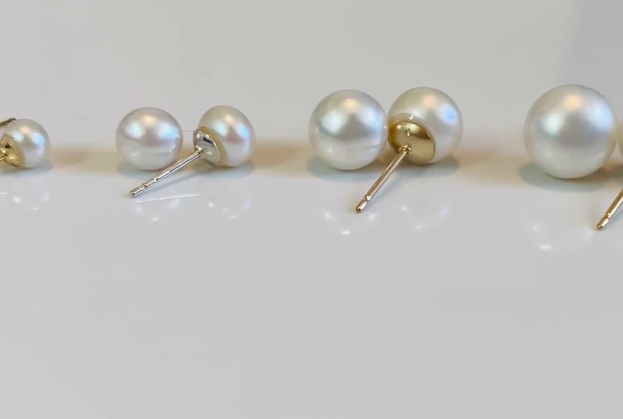 Pearl earrings with 2024 gold trim