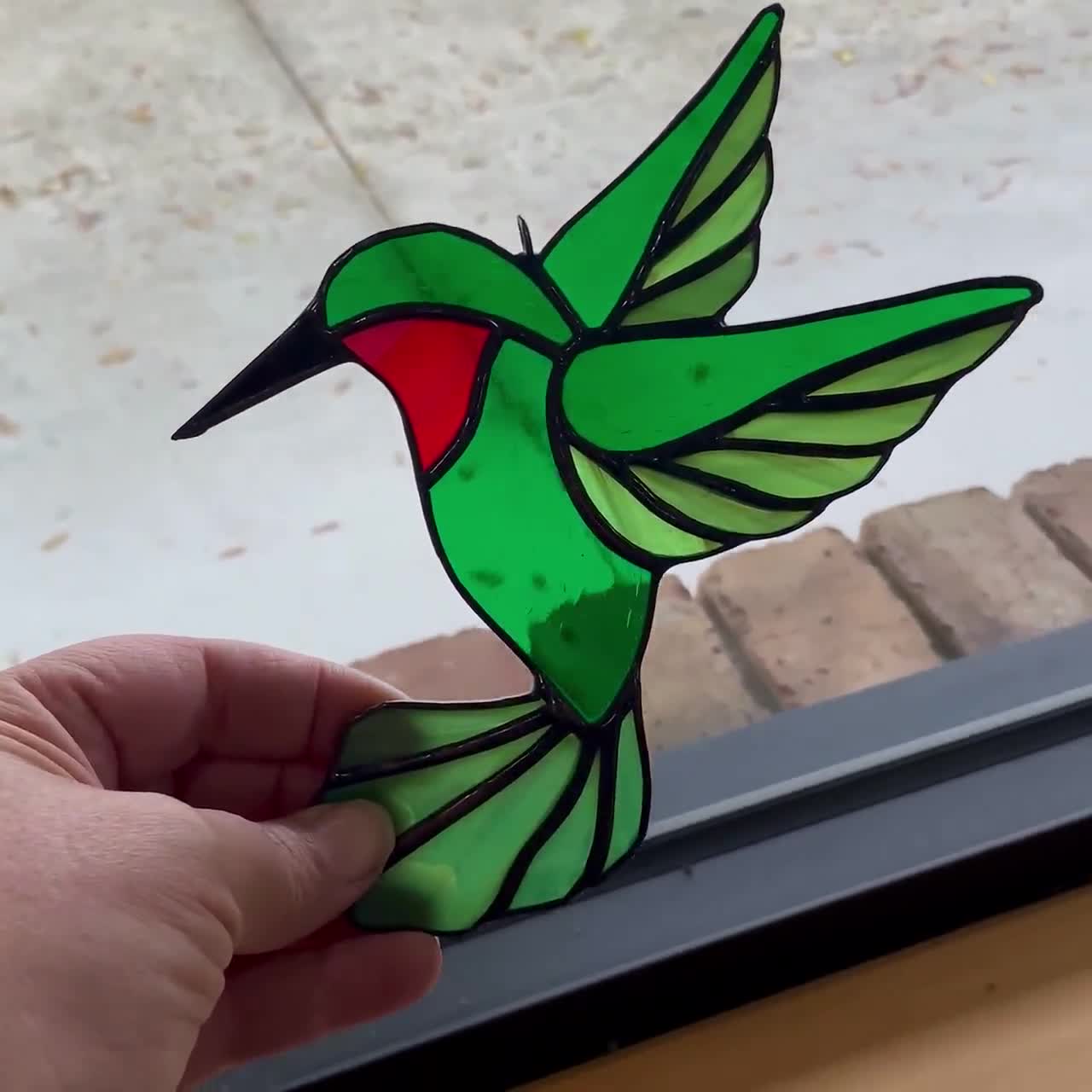 Attrape-soleil élégant en forme de colibri · Creative Fabrica