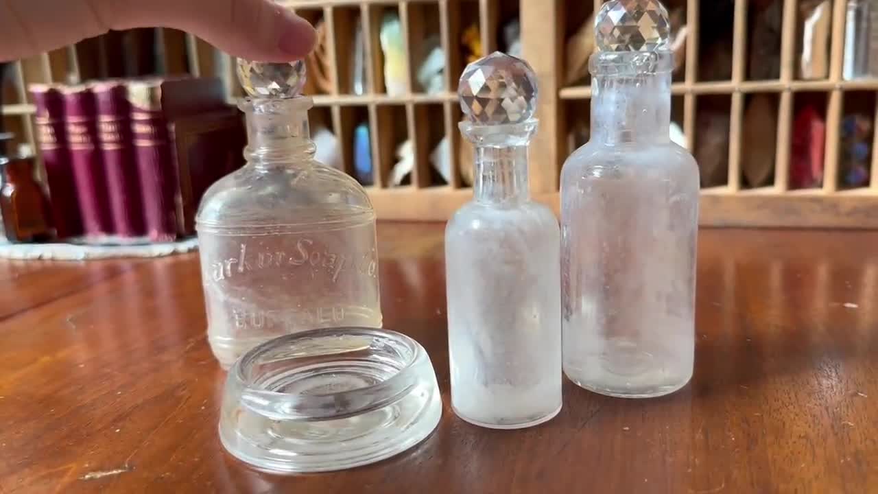 Four Vintage Clear Glass Bottles – Small Town Antiques