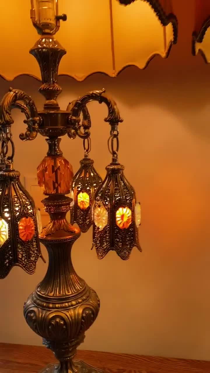 Pair of Loevsky & Loevsky Amber Lucite and Brass Hollywood Regency
