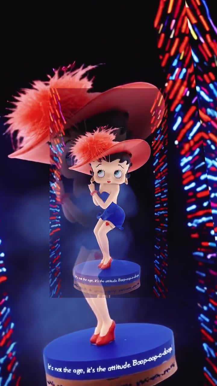 Gorgeous Collectible Figurine of Betty Boop With a Purple Dress