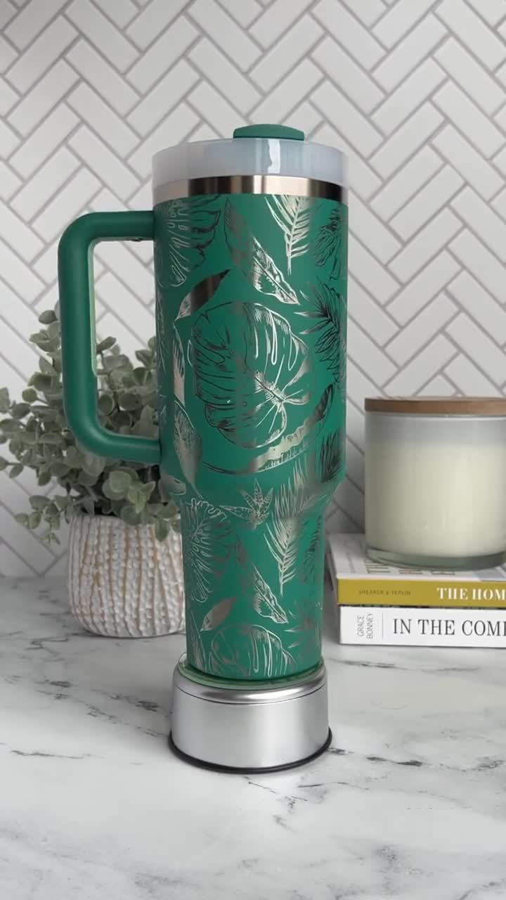 You Can Get A Pastel Green Stanley Cup Decorated With House Plants